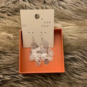 Silver earrings never worn